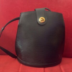 Louis Vuitton Elegant Black Bag with Gold Button